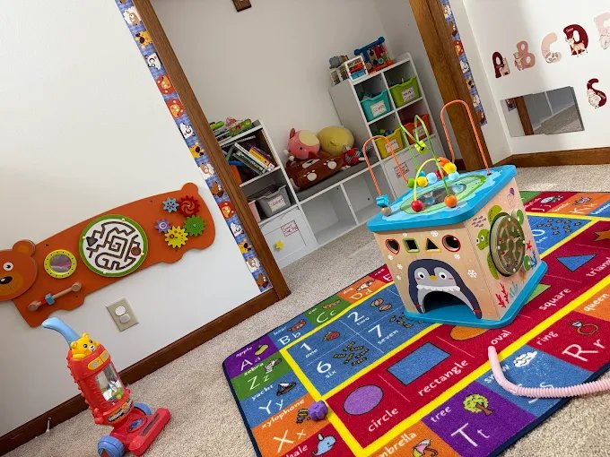 Colorful playroom with educational toys at Graceland Kids Center