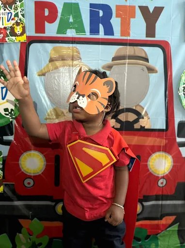 Child doing crafts and creative arts at Graceland Kids Center