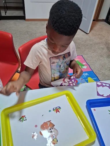 Graceland Kids team in classroom at Graceland Kids Center