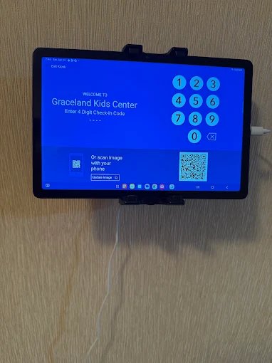 Children on playground during outdoor adventures at Graceland Kids Center