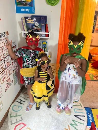 Colorful toy storage and organized play space at Graceland Kids Center